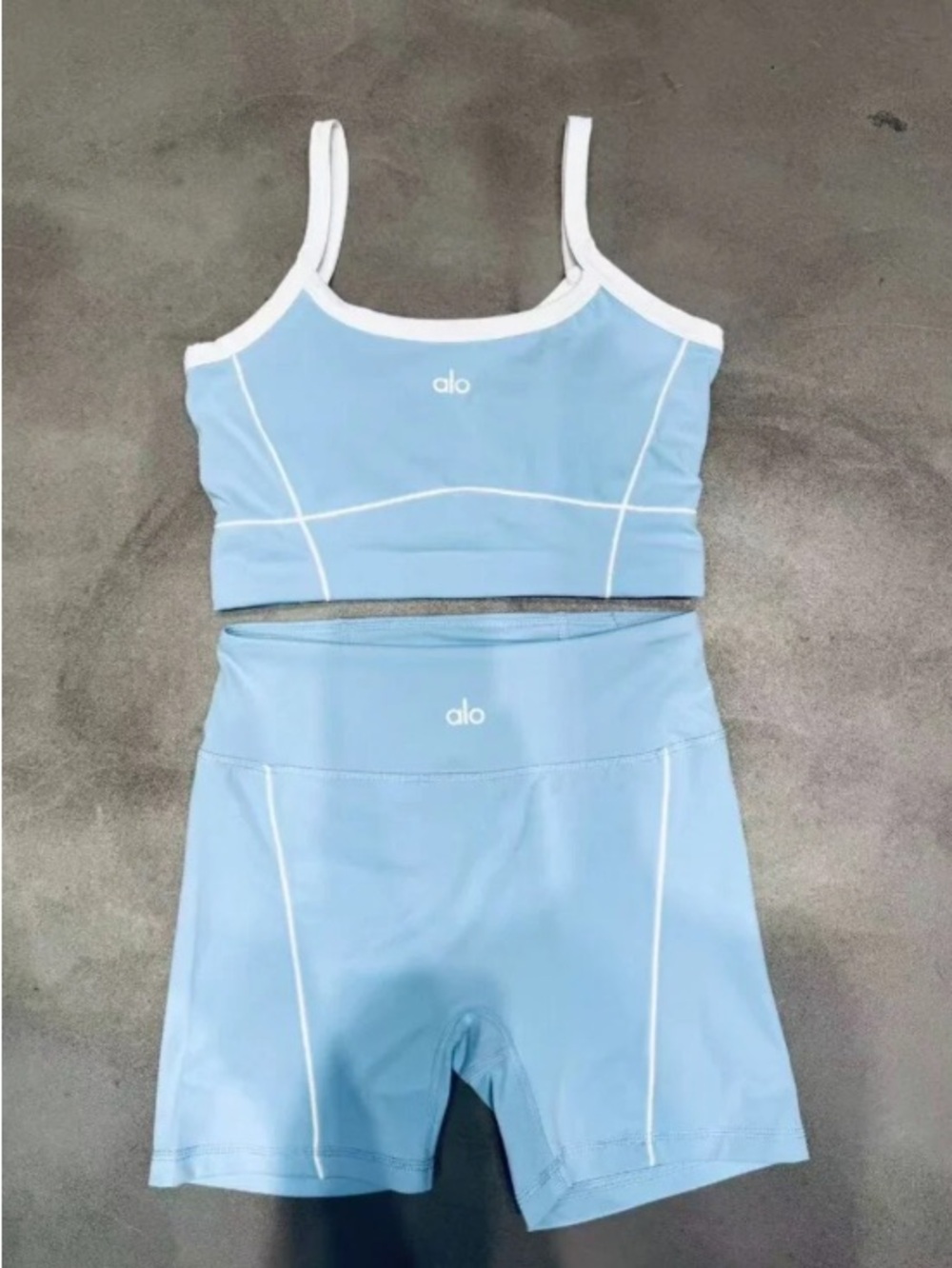 ALO Yoga blue athletic tank top and shorts set